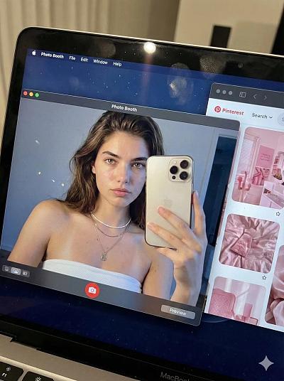 MacBook屏幕特写：Photo Booth自拍与Pint